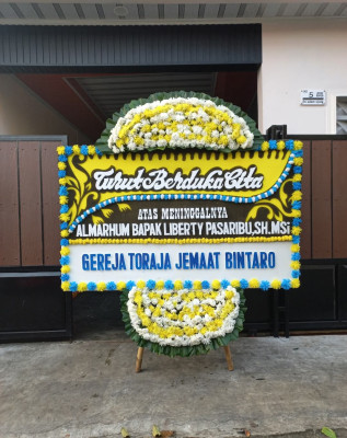Papan Bunga Duka di Teluk Deya